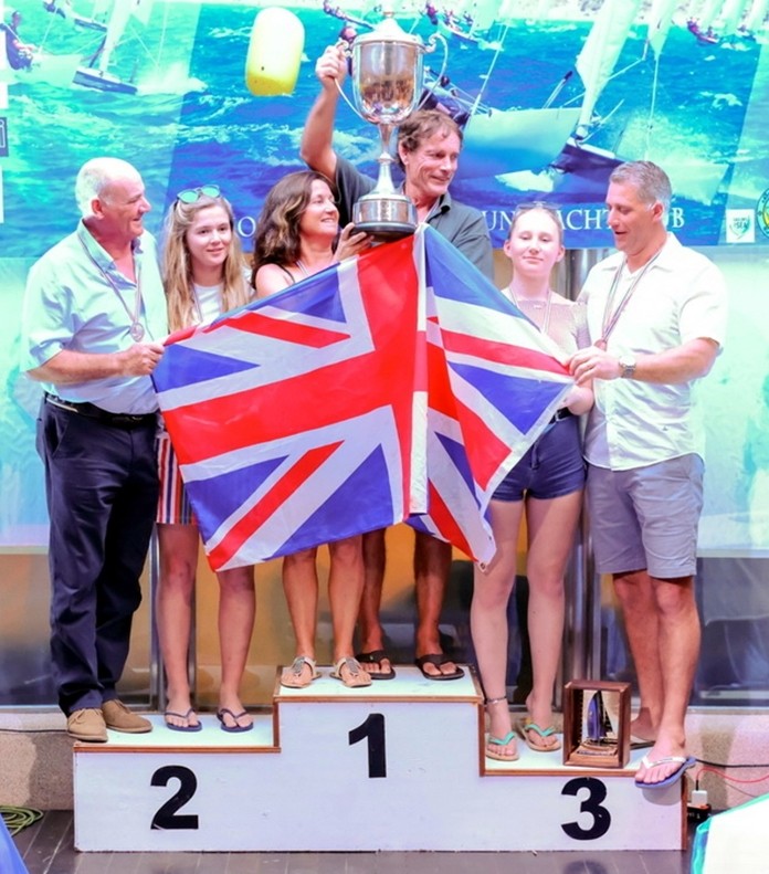 Dave and Louise Roberts (center) pose on the podium with the champions’ trophy after winning the 2019 Dart-18 World Championship at Royal Varuna Yacht Club in Pattaya, Friday, Feb. 22. On the left are runners-up Gareth Owen and Hebe Hemming and on the right third placed Daniel Norman with crew Alyesha Monkman.