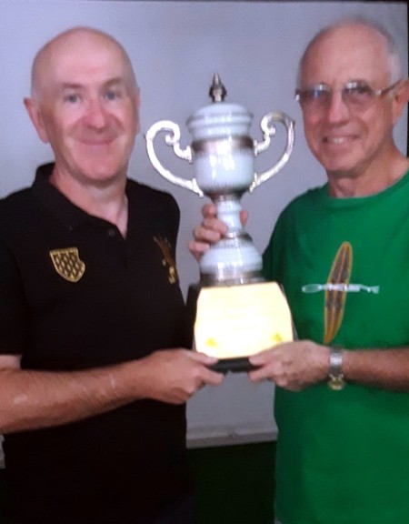 Ken Hole & Pat Culloty hold up the St. Patrick’s Day Cup.