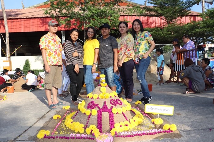 Nongprue Sub-district residents and employees enjoy the Songkran holiday by building sand pagodas at Suttawas Temple.
