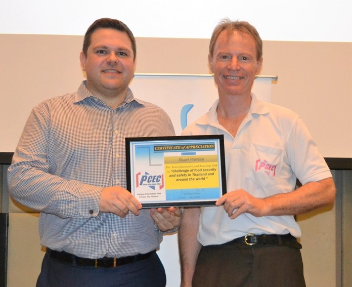 MC Ren Lexander presents Stuart Prentice with the PCEC's Certificate of Appreciation for his informative and interesting presentation about food security and safety in today's world.