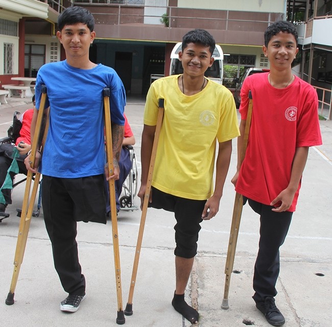 Athletes in the one-legged race.