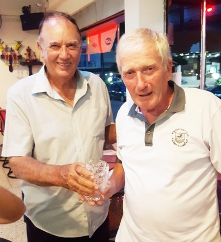 Jimmy presents Sean Murphy with the golfer of the month trophy.