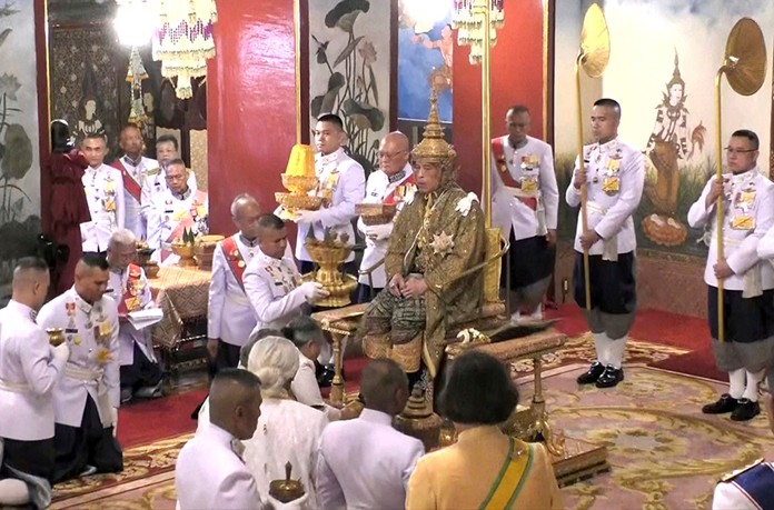 His Majesty King Maha Vajiralongkorn Phra Vajiraklaochaoyuhua sits on the throne as he is officially crowned king at the Grand Palace, Saturday, May 4, 2019, in Bangkok.
