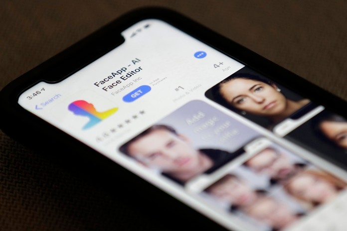 FaceApp is displayed on an iPhone Wednesday, July 17, 2019, in New York. (AP Photo/Jenny Kane)