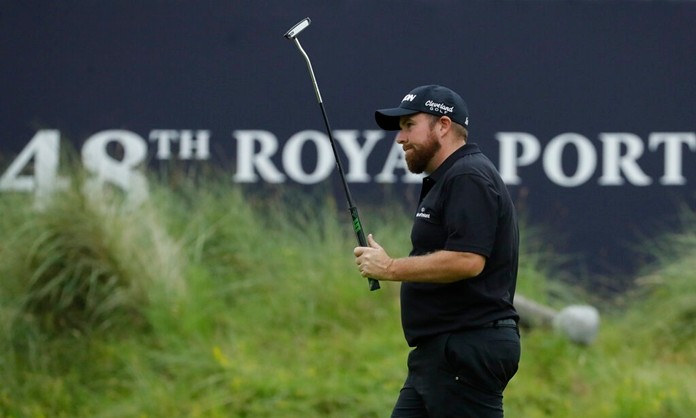 Ireland's Shane Lowry acknowledges the crowd during the second round of the British Open Golf Championships at Royal Portrush in Northern Ireland, Friday, July 19, 2019.(AP Photo/Matt Dunham)
