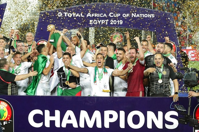 Algerian players celebrate after winning the African Cup of Nations final soccer match between Algeria and Senegal in Cairo International stadium in Cairo, Egypt, Friday, July 19, 2019. (AP Photo/Hassan Ammar)