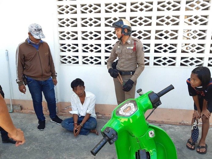 Weeradech Udomdej (sitting) was arrested after allegedly trying to steal a motorcycle at Chaimongkol Temple on July 21.