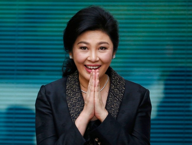 In this Aug. 1, 2017, file photo, Thailand's former Prime Minister Yingluck Shinawatra arrives at the Supreme Court to make her final statements in a trial on a charge of criminal negligence in Bangkok, Thailand. (AP Photo/Sakchai Lalit, File)