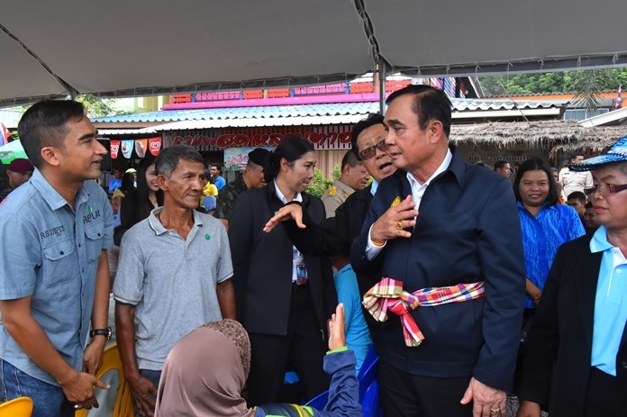 Prime Minister Gen Prayut Chan-o-cha promises to help low-income people make a better living.