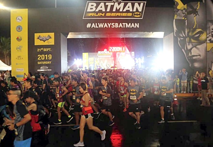 Participants set out on the 80-years Batman Charity Night Run, Saturday, Sept. 21.