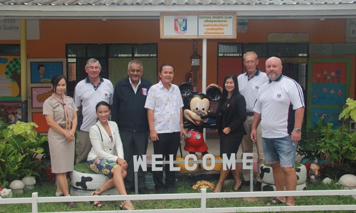 Mrs. Kwanruean Salaewong, VP Tim Knight, Ingkarat Chaimongkon, Peter Malhotra, Dr. Veera Ladnongkun, Noi Emmerson, Willem Lasonder and Dave Smith pose in the mini garden that is part and parcel of the beautification of the school project.