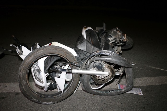 Two people sustained multiple injuries when the motorcycle they were riding veered off the road and struck a concrete kilometer marker in Sattahip.
