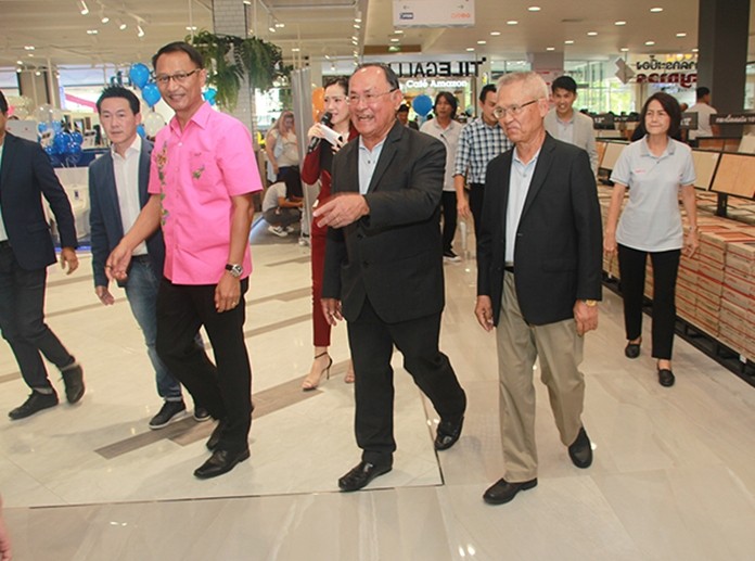 Boonthavorn executives and honored guests tour the new showroom.