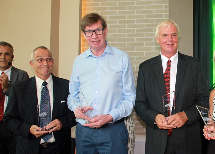 Hansi Konrad Nyvoll, Jan Olav Aamlid and Pastor Ragnvald Seierstad, three original members of the building committee. Jan Olav is a major benefactor of the church having also jointly donated funds to buy the organ.