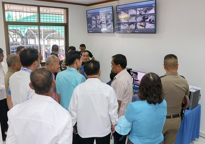 Officials inspect the new CCTV Control Center in the Nongprue Municipality Building.