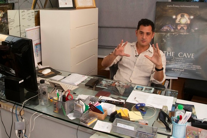 In this Sept. 16, 2019, photo, "The Cave" movie director Tom Waller talks to The Associated Press during an interview in Bangkok. (AP Photo/Sakchai Lalit)