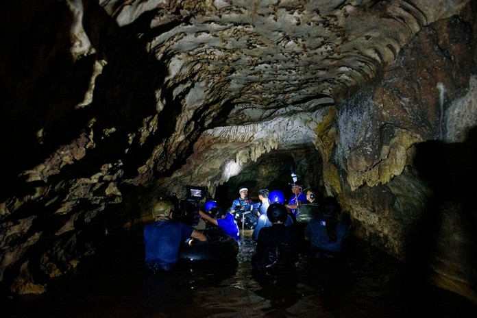 This Nov. 23, 2018, photo provided by De Warrenne Pictures, shows director Tom Waller's film "The Cave" on location in Thailand. (De Warrenne Pictures via AP)