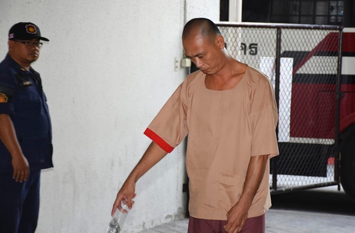 Taiwan national Chen Kuan Lin exits a prison bus after arriving at the criminal court in Bangkok, Thailand, Wednesday, Oct. 9, 2019. The Bangkok Criminal Court delivered Chen the death penalty but commuted his sentence to life imprisonment after trying to smuggle 5.6 kilograms (12.3 lbs.) of heroin out of Thailand. (AP Photo)