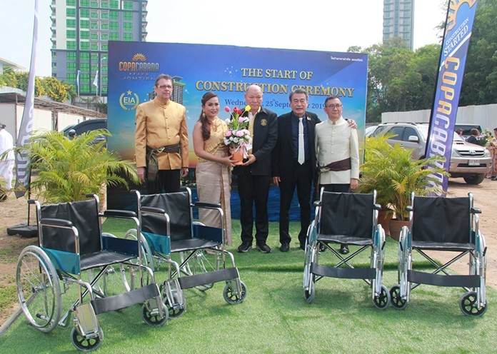 Copacabana Beach Jomtien directors Kasina Thammasuwan, Rolf Wilhelm Haupt and Manfred Wu donated 1,000 wheelchairs for seniors and the disabled, received by Pattaya Deputy Mayors Ronakit Ekasingh and Banlue Kullavanijaya.