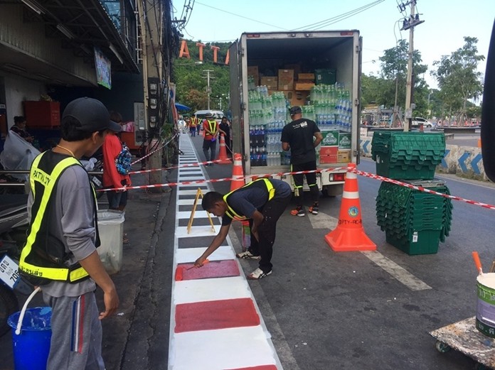 A city crew went in Oct 24, put up no parking signs and painted wide red and white no parking stripes in front of the automatic parking building where most of the fisticuffs had been filmed by tourists and posted to social media.