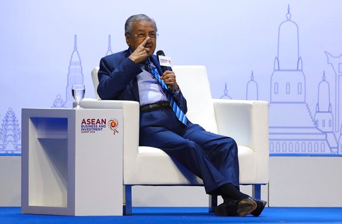 Malaysian Prime Minister Mahathir Mohamad gestures as he speaks during the ASEAN Business and Investment Summit (ABIS), a parallel event to the ASEAN summit in Nonthaburi, Thailand, Saturday, Nov. 2, 2019. (AP Photo/Aijaz Rahi)