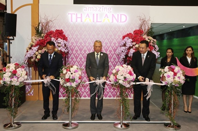 From left: Mr. Thosaporn Sirisumphand, Chairman of TAT Board of Directors (left); H.E. Mr. Phiphat Ratchakitprakarn, Minister of Tourism and Sports (center); and Mr. Yuthasak Supasorn, Governor of the Tourism Authority of Thailand (right).