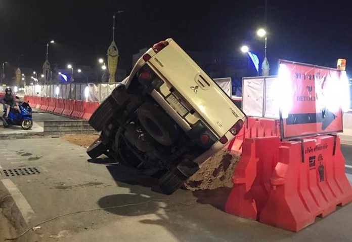 With so many holes dug up on Pattaya roads, this was bound to happen. Luckily the driver was not hurt.