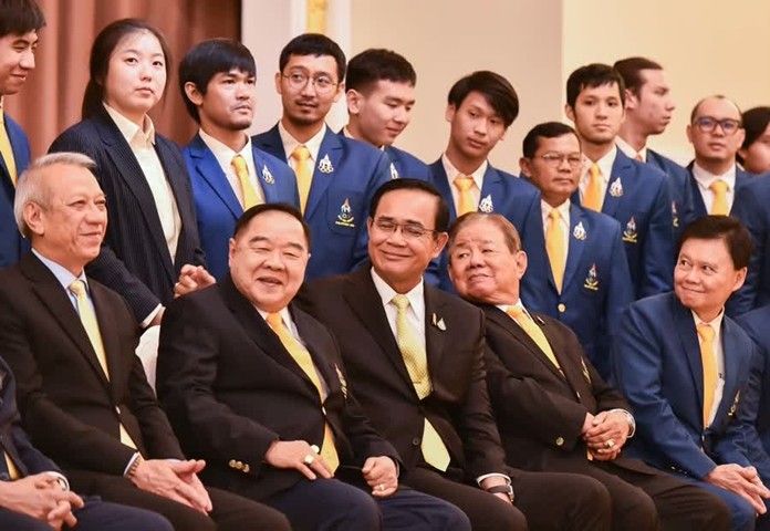 Prime Minister Gen Prayut Chan-o-cha and Deputy Prime Minister Gen Prawit Wongsuwanwas meet the Thai national team at Government House.