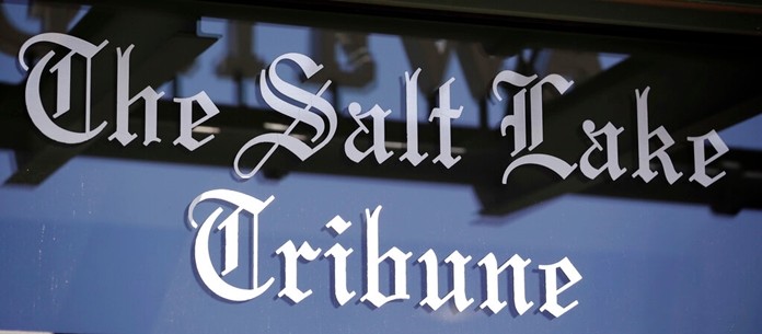 This April 20, 2016, file photo shows the Salt Lake Tribune sign in Salt Lake City. Tribune publisher Paul Huntsman learned earlier this month that the Internal Revenue Service had approved the paper’s plan to become a public charity, which lets people claim tax deductions for donations to support its journalism. (AP Photo/Rick Bowmer, File)