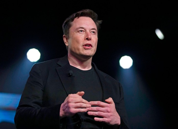Tesla CEO Elon Musk speaks before unveiling the Model Y at Tesla's design studio in Hawthorne, Calif. March 14, 2019. (AP Photo/Jae C. Hong, File)