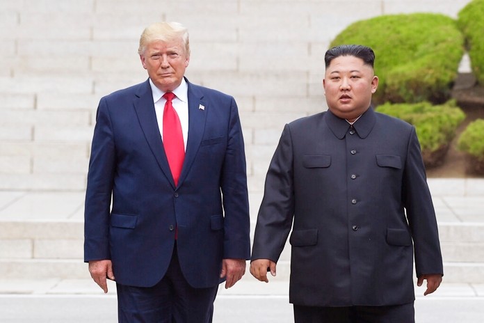 In this June 30, 2019, file photo, President Donald Trump, left, meets with North Korean leader Kim Jong Un at the North Korean side of the border at the village of Panmunjom in Demilitarized Zone. (AP Photo/Susan Walsh, File)