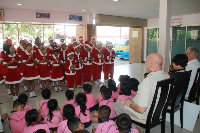 Children sing Christmas Carols for their honored guests.