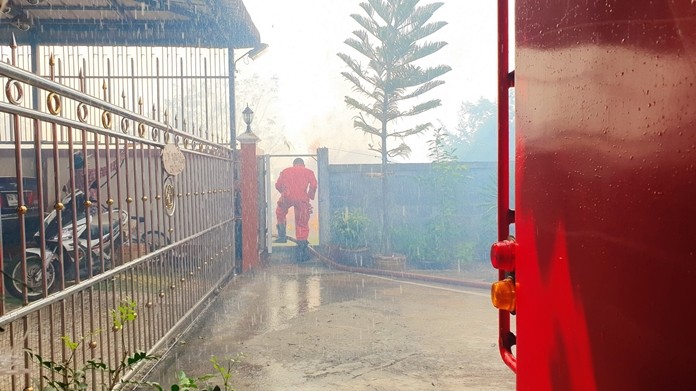 Residents were evacuated temporarily when flames began lapping at their doors.