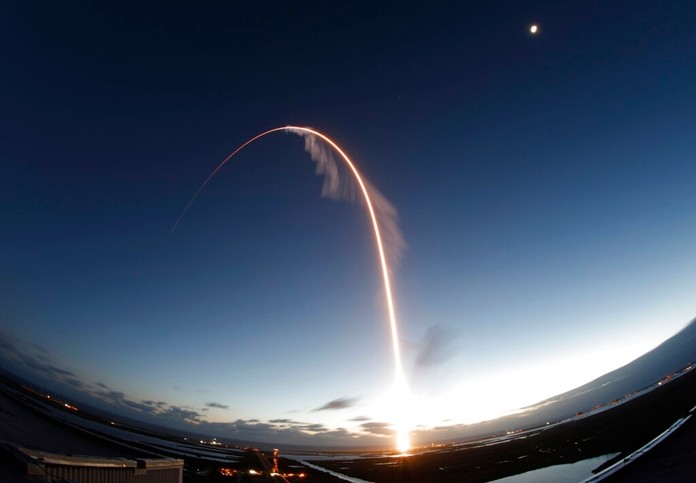 A time exposure of the United Launch Alliance Atlas V rocket carrying the Boeing Starliner crew capsule on an Orbital Flight Test to the International Space Station lifts off from Space Launch Complex 41 at Cape Canaveral Air Force station, Friday, Dec. 20, 2019, in Cape Canaveral, Fla. (AP Photo/Terry Renna)