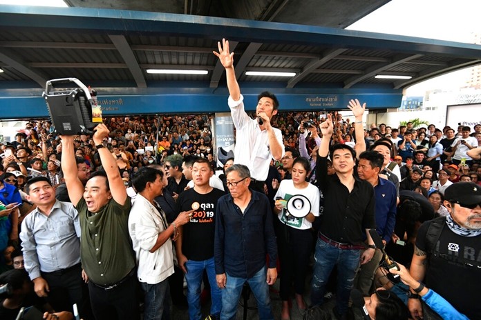 In this Dec. 14, 2019, file photo, Thailand's Future Forward Party leader ThanathornJuangroongruangkit talks to his supporters during rally in Bangkok, Thailand.(AP Photo, File)