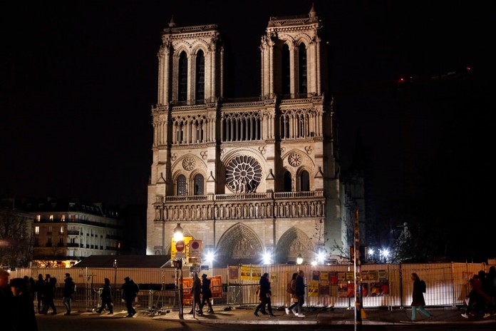 Notre Dame cathedral is pictured in Paris, Tuesday, Dec. 24, 2019. Notre Dame Cathedral is unable to host Christmas services for the first time since the French Revolution, because the Paris landmark was too deeply damaged by this year's fire. (AP Photo/Thibault Camus)