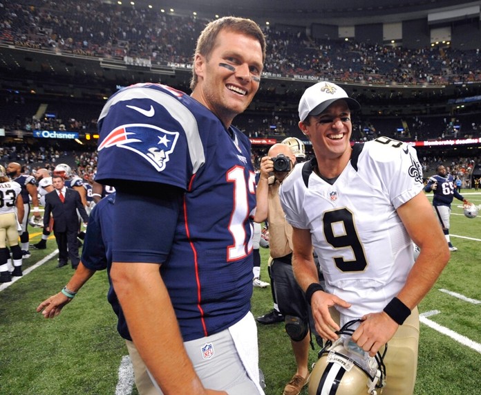 In this Aug. 22, 2015, file photo, New England Patriots quarterback Tom Brady (12) and New Orleans Saints quarterback Drew Brees (9) greet each other after an NFL preseason football game in New Orleans. Between them, Brady and Brees have played 38 pro football seasons, 39 if you count 2008 when the New England star wrecked his knee in Week 1, and could be doing so against each other on Feb. 2 in a little thing called the Super Bowl. (AP Photo/Bill Feig. File)