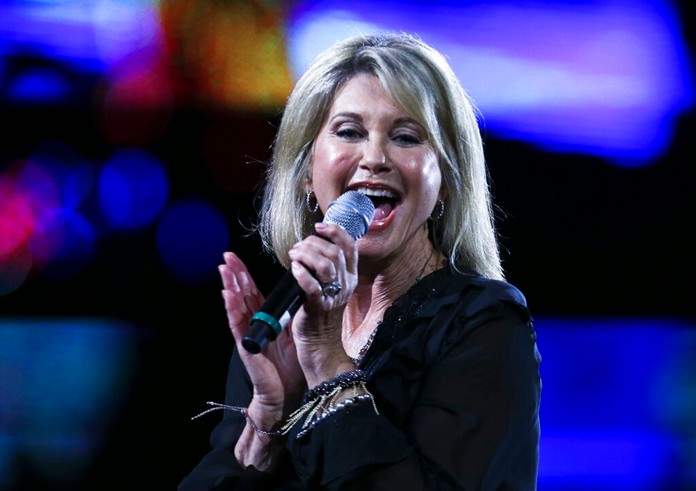Olivia Newton John performs during the Vina del Mar International Song Festival at the Quinta Vergara in Vina del Mar, ChileThursday, Feb. 23, 2017. (AP Photo/Esteban Felix, File)