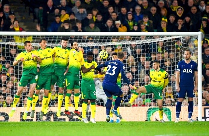 Tottenham Hotspur's Christian Eriksen, center, scores against Norwich City during the English Premier League soccer match at Carrow Road, Norwich, England, Saturday Dec. 28, 2019. (Joe Giddens/PA via AP)