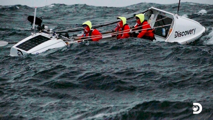 This image released by Discovery shows a scene from “The Impossible Row," documenting endurance athlete Colin O’Brady and his crew's crossing of the treacherous icy waters of The Drake Passage by row boat. Located between the Southern tip of South America and the edge of Antarctica the Drake Passage is considered one of the most terrifying and dangerous sea paths in the world. They finished crossing the Drake Passage in 13 days. (Discovery via AP)