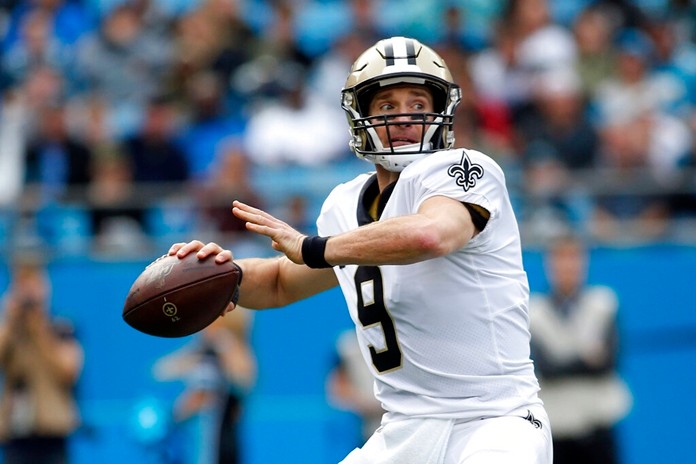 New Orleans Saints quarterback Drew Brees (9) passes against the Carolina Panthers during the first half of an NFL football game in Charlotte, N.C., Sunday, Dec. 29, 2019. (AP Photo/Brian Blanco)