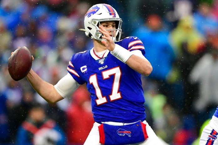 Buffalo Bills quarterback Josh Allen (17) throws a pass during the first half of an NFL football game against the New York Jets in Orchard Park, N.Y. In making his NFL playoff debut against the Texans this weekend, second-year Buffalo Bills quarterback Josh Allen gets an opportunity to show how far he's come since his last trip to Houston 14 months ago. (AP Photo/David Dermer, File)