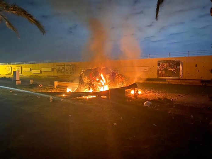 This photo released by the Iraqi Prime Minister Press Office shows a burning vehicle at the Baghdad International Airport following an airstrike in Baghdad, Iraq, early Friday, Jan. 3, 2020.(Iraqi Prime Minister Press Office via AP)