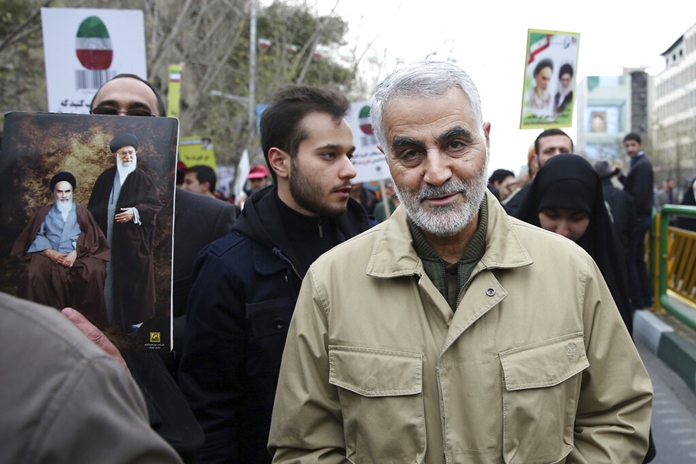 In this Thursday, Feb. 11, 2016, file photo, Qassem Soleimani, commander of Iran's Quds Force, attends an annual rally commemorating the anniversary of the 1979 Islamic revolution, in Tehran, Iran. (AP Photo/Ebrahim Noroozi, File)