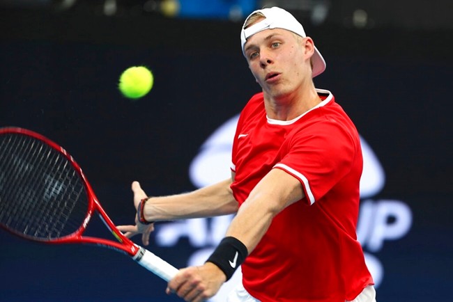 Denis Shapovalov of Canada plays a shot during his match against Stefanos Tsitsipas of Greece at the ATP Cup tennis tournament in Brisbane, Australia, Friday, Jan. 3, 2020. (AP Photo/Tertius Pickard)