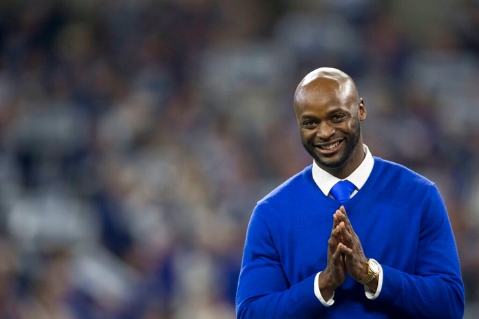 In this Nov. 18, 2018, file photo, former Indianapolis Colts wide receiver Reggie Wayne wais during a Colts Ring of Honor ceremony at halftime of an NFL football game between the Indianapolis Colts and the Tennessee Titans in Indianapolis. (AP Photo/AJ Mast, File)