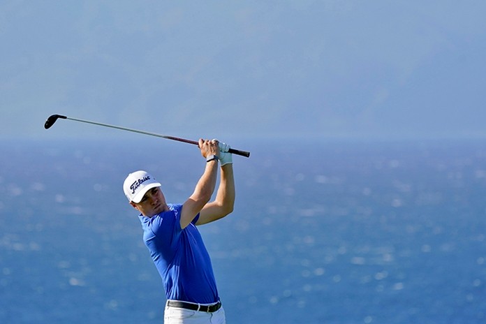 Justin Thomas plays his shot from the 13th tee during final round of the Tournament of Champions golf event, Sunday, Jan. 5, 2020, at Kapalua Plantation Course in Kapalua, Hawaii. (AP Photo/Matt York)