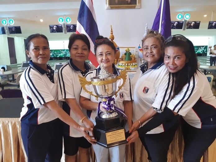 The Champions hold the HRH Princess Maha Chakri Sirindhorn Trophy. 
