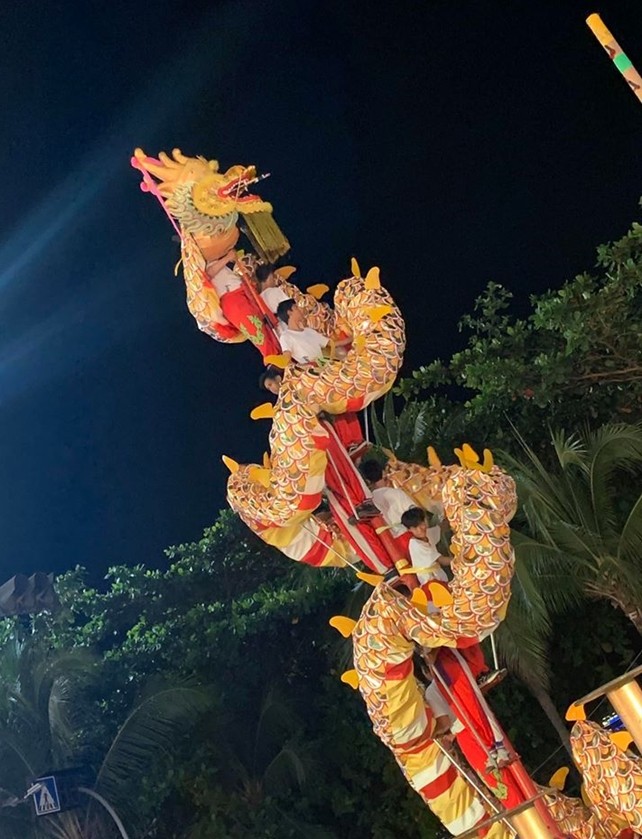 Acrobats ascend to the sky with an awe-inspiring dragon show at Royal Garden Plaza Pattaya.