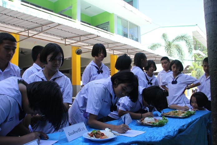 Seventh-graders whip up spicy seafood dishes in a cooking contest at Pattaya School No. 5.